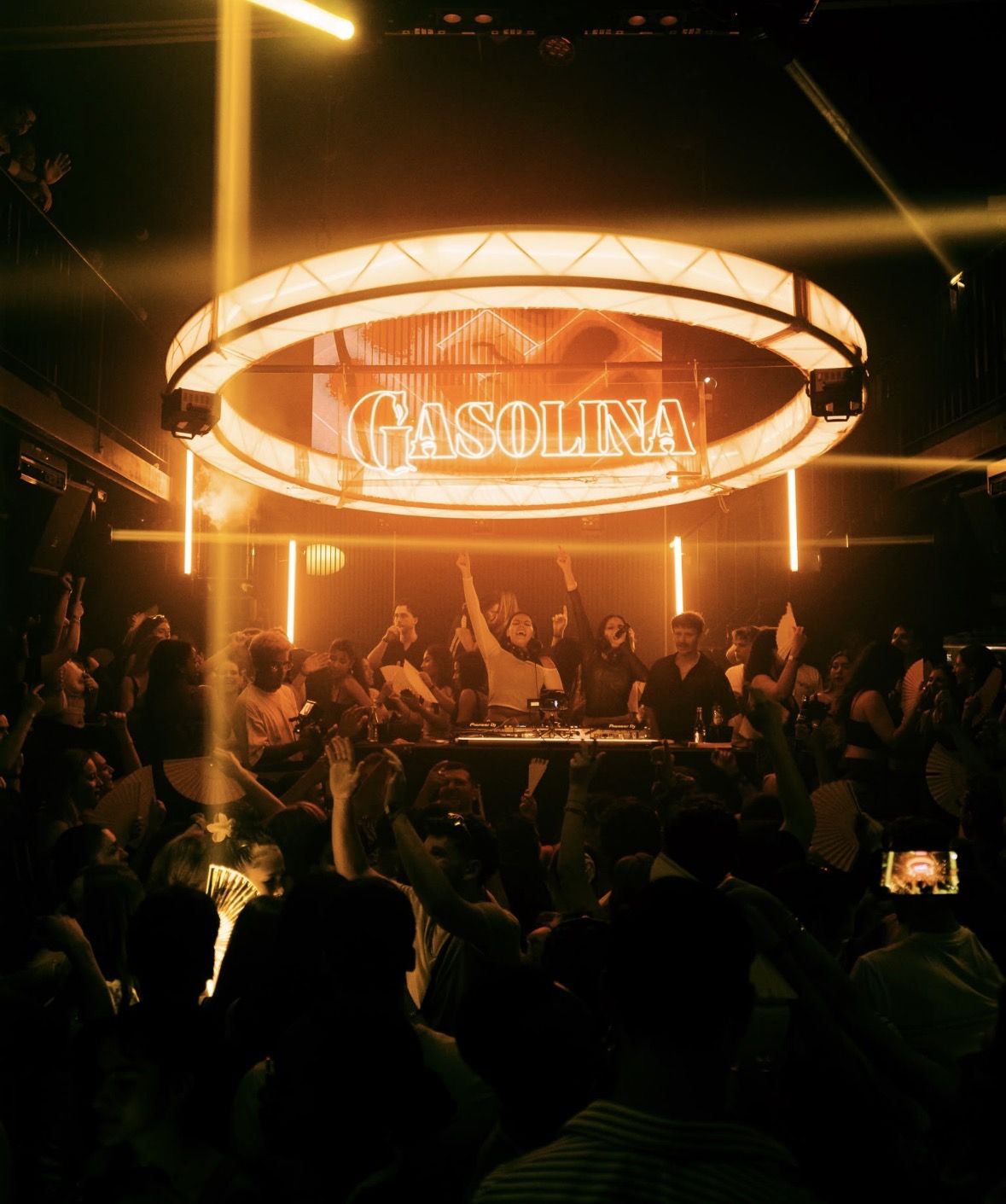 Golden light ring above the Gasolina DJ booth