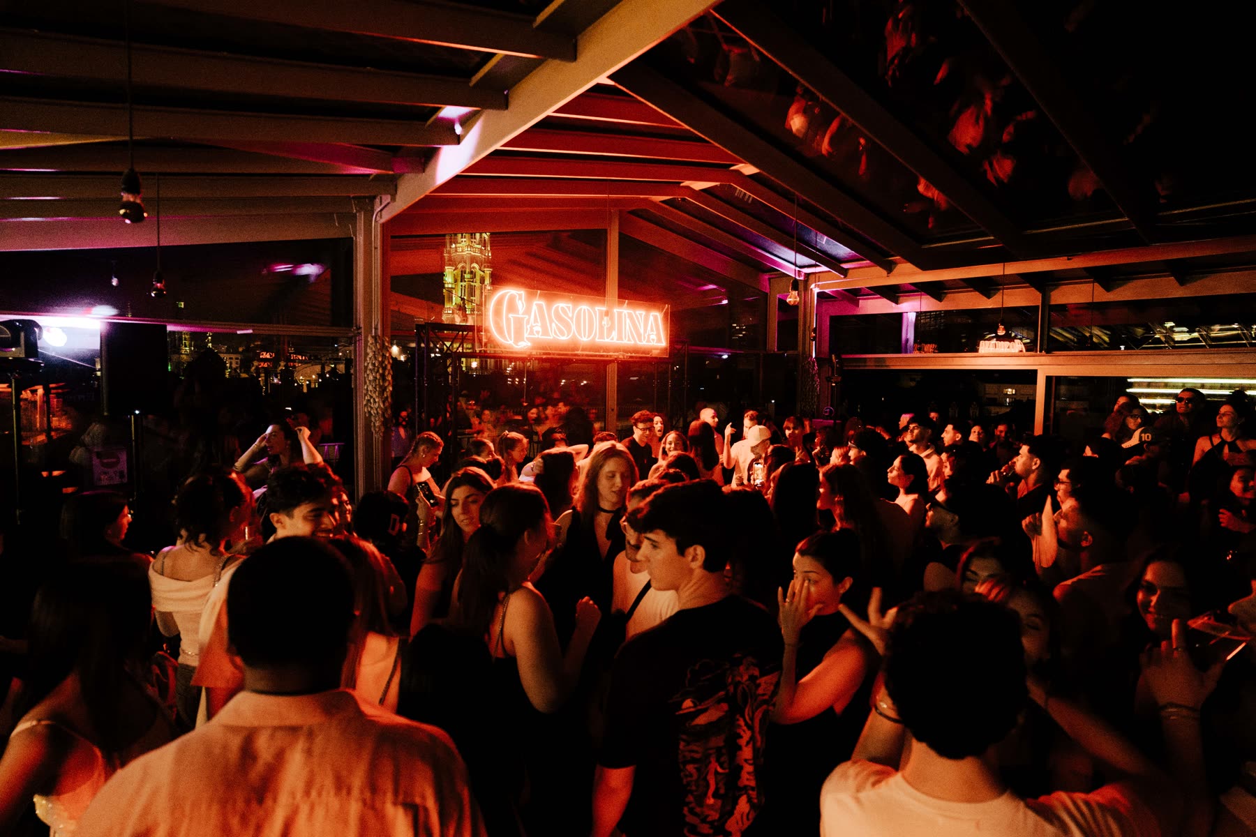 Friends dancing together at a Gasolina Social Club night